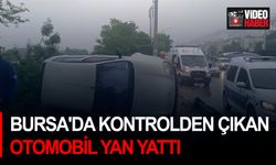 Bursa'da kontrolden çıkan otomobil yan yattı