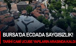 Bursa'da ecdada saygısızlık! 658 yıllık tarihi cami ucube yapıların arasında kaldı