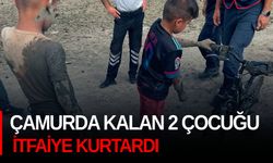 Çamurda kalan 2 çocuğu itfaiye kurtardı