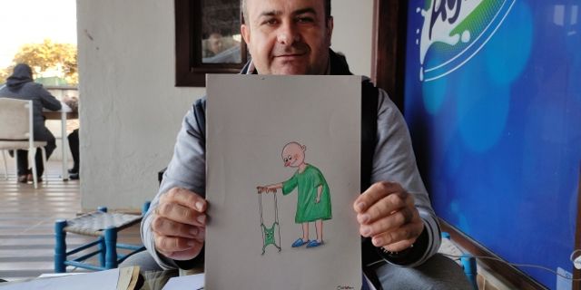 Karikatürleriyle kanser hastalarının moral bulmasını sağlıyor
