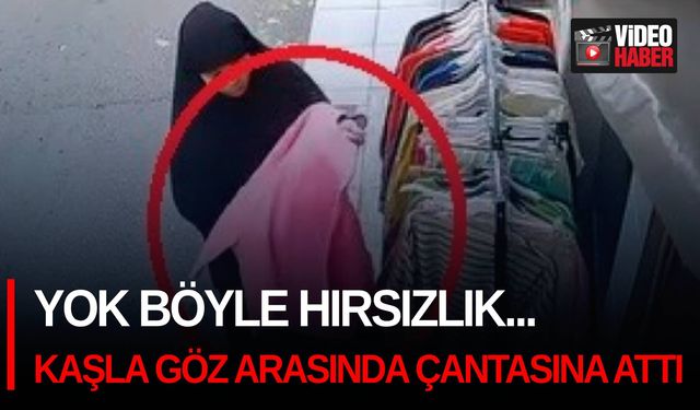 Yok böyle hırsızlık... Kaşla göz arasında kıyafeti çantasına attı